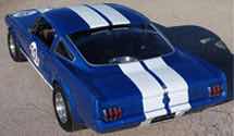 Picture of a blue classic shelby with a white stripe
